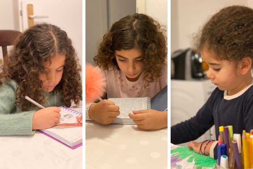 3 girls taking notes in the family meeting
