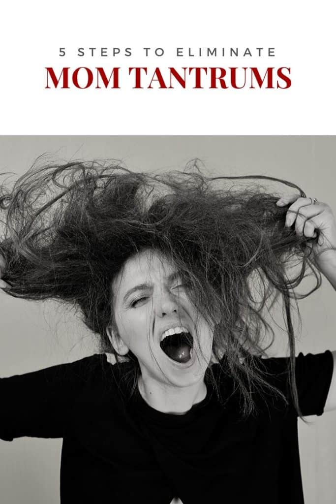 A girl pulling her hair going through a mom tantrum 