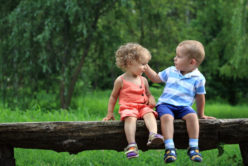 Boy being kind to his sister