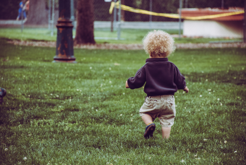 Baby making mistakes to learn to walk