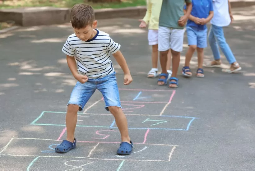 Children enjoying outdoor play or creative activities away from screens